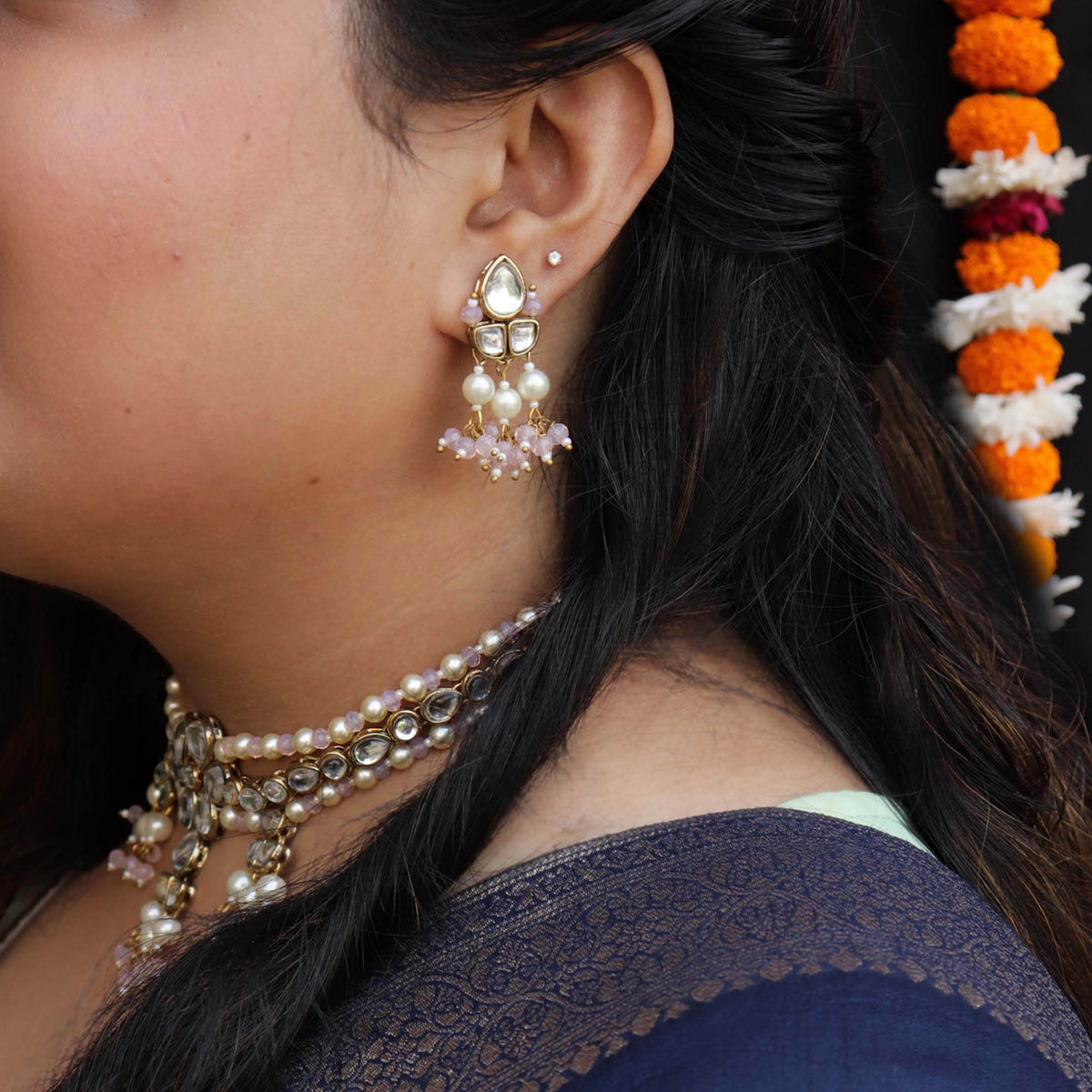Traditional Kundan earrings in gold-tone, perfect for weddings and festive wear