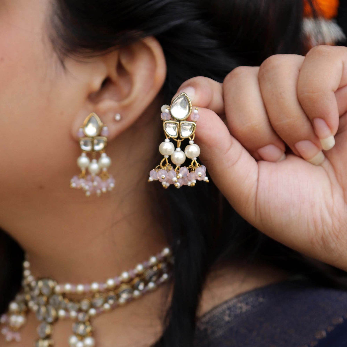 Traditional Kundan earrings in gold-tone, perfect for weddings and festive wear
