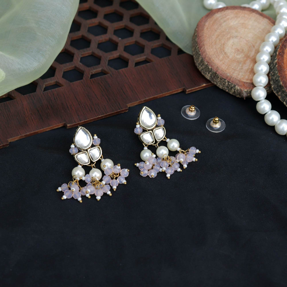 Traditional Kundan earrings in gold-tone, perfect for weddings and festive wear