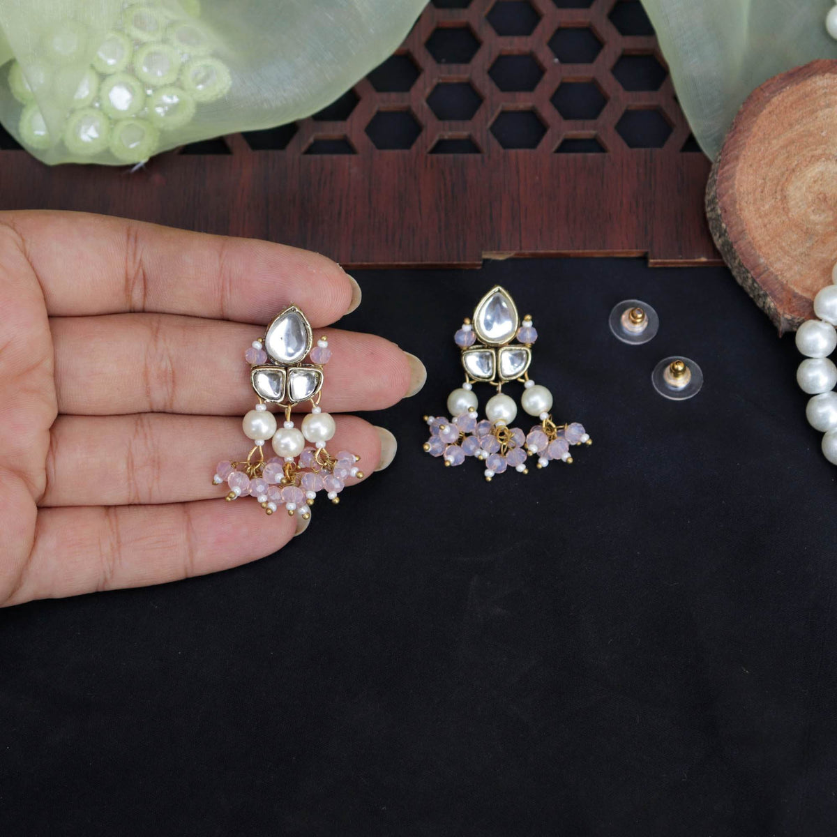 Traditional Kundan earrings in gold-tone, perfect for weddings and festive wear