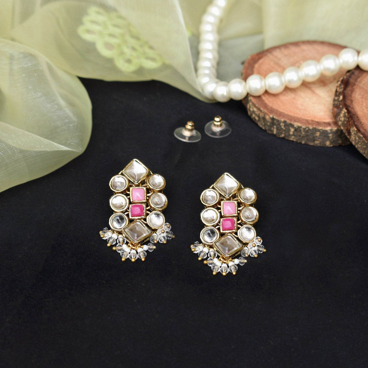 Traditional Kundan earrings in gold-tone, perfect for weddings and festive wear