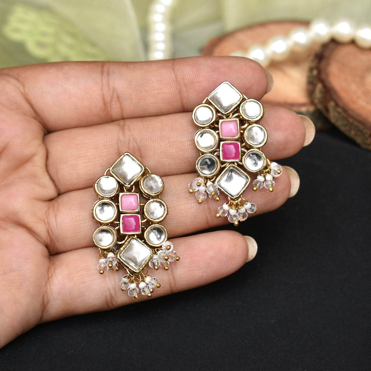 Traditional Kundan earrings in gold-tone, perfect for weddings and festive wear