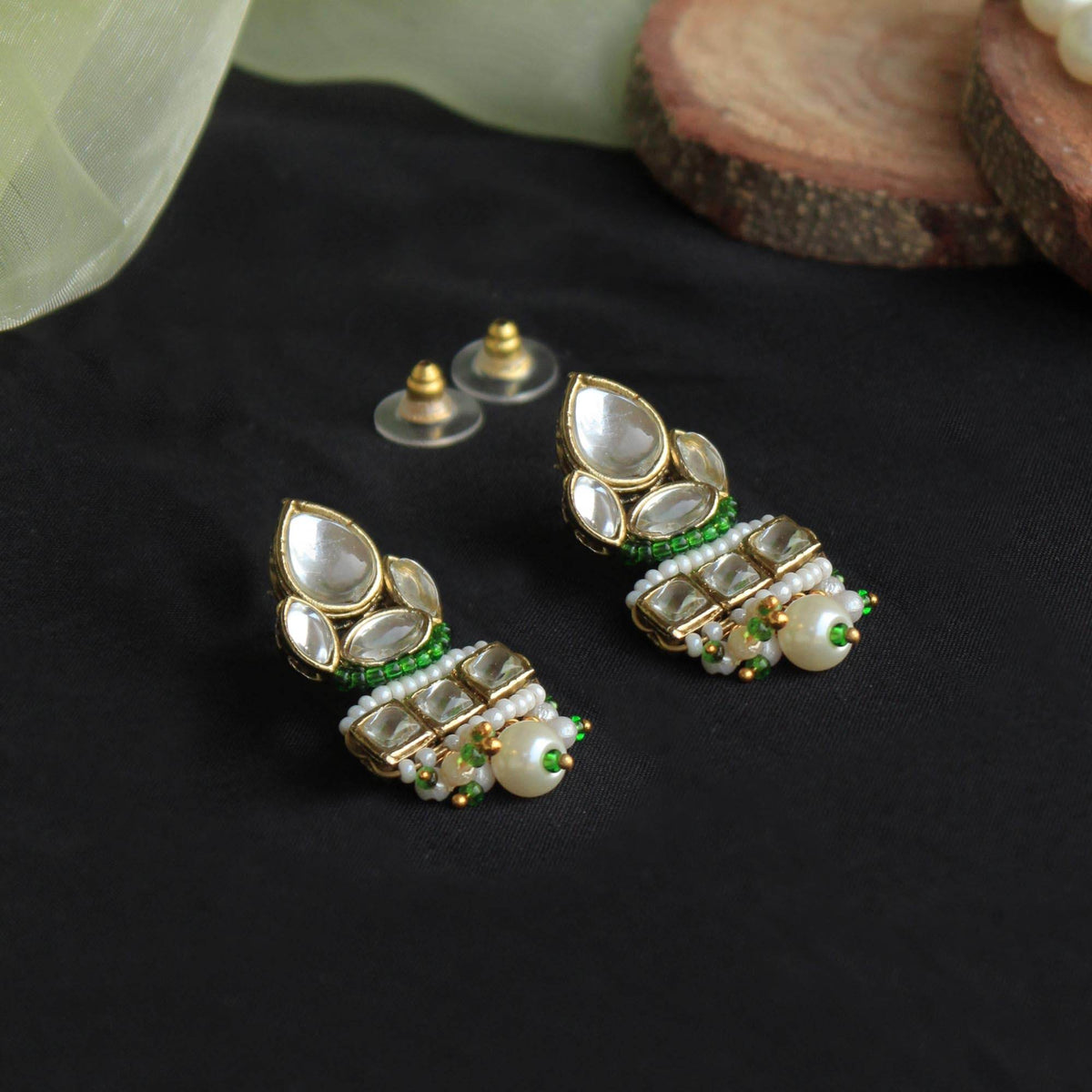 Traditional Kundan earrings in gold-tone, perfect for weddings and festive wear