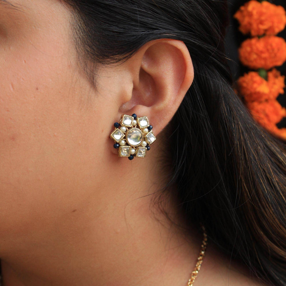 Traditional Kundan earrings in gold-tone, perfect for weddings and festive wear