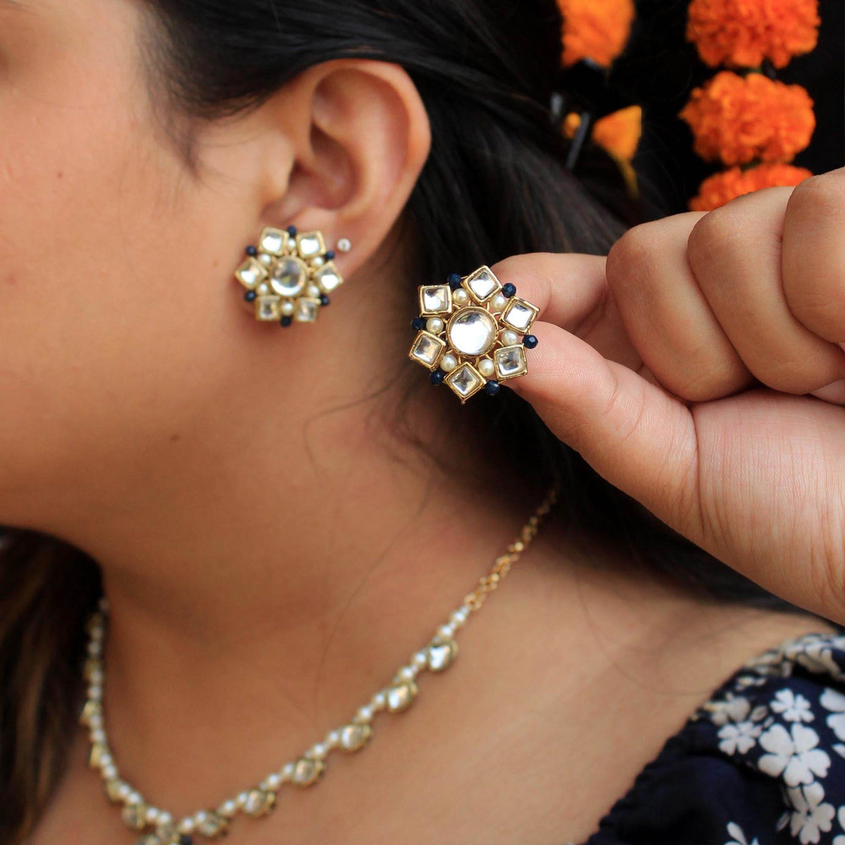 Traditional Kundan earrings in gold-tone, perfect for weddings and festive wear