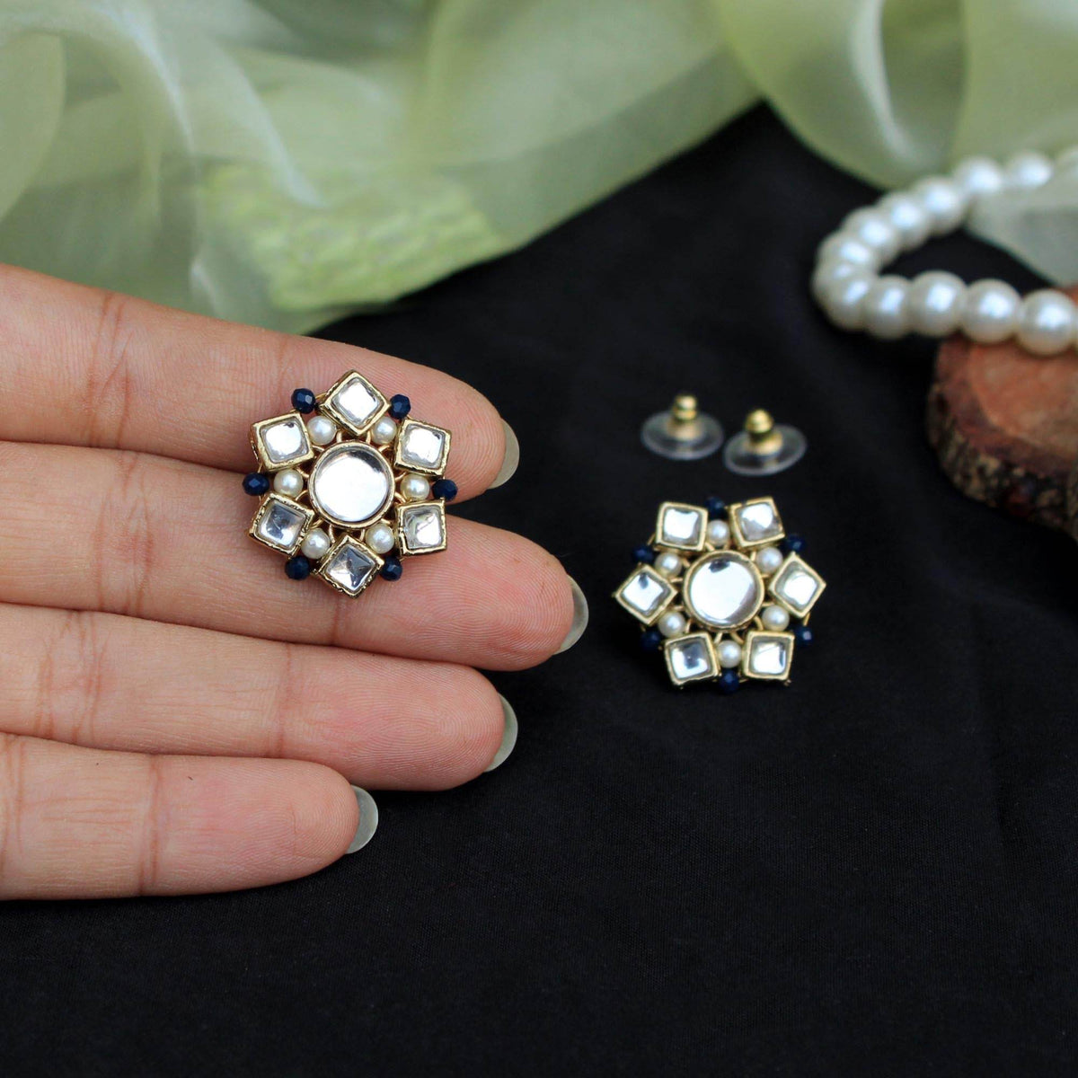 Traditional Kundan earrings in gold-tone, perfect for weddings and festive wear