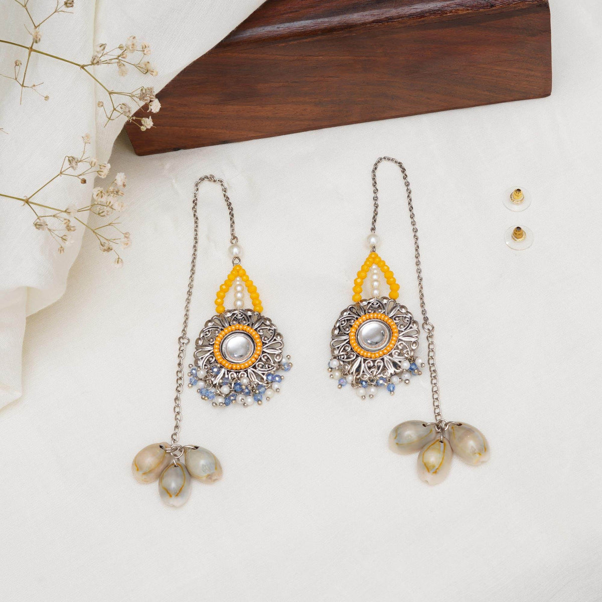 Traditional Kundan earrings in gold-tone, perfect for weddings and festive wear