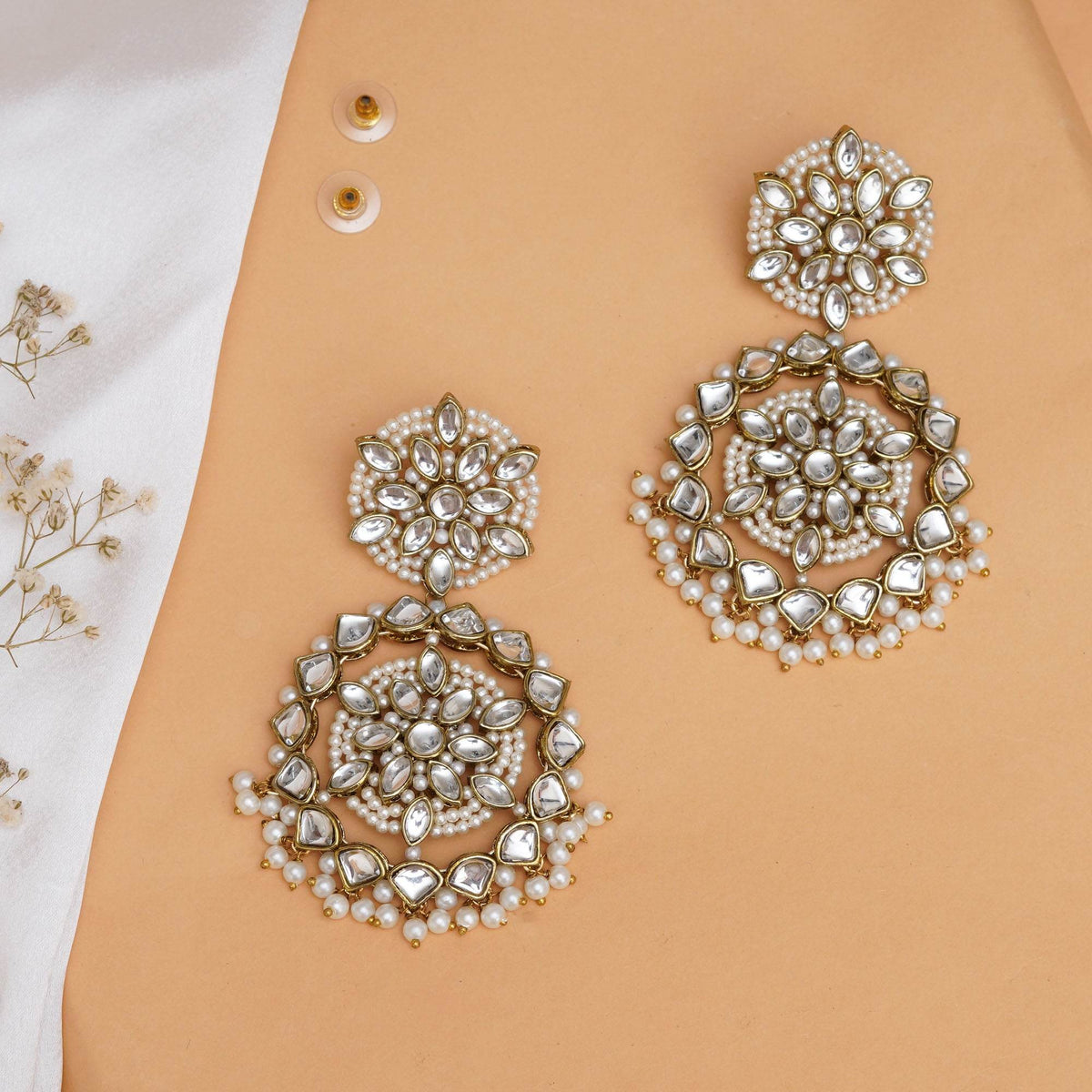 Traditional Kundan earrings in gold-tone, perfect for weddings and festive wear