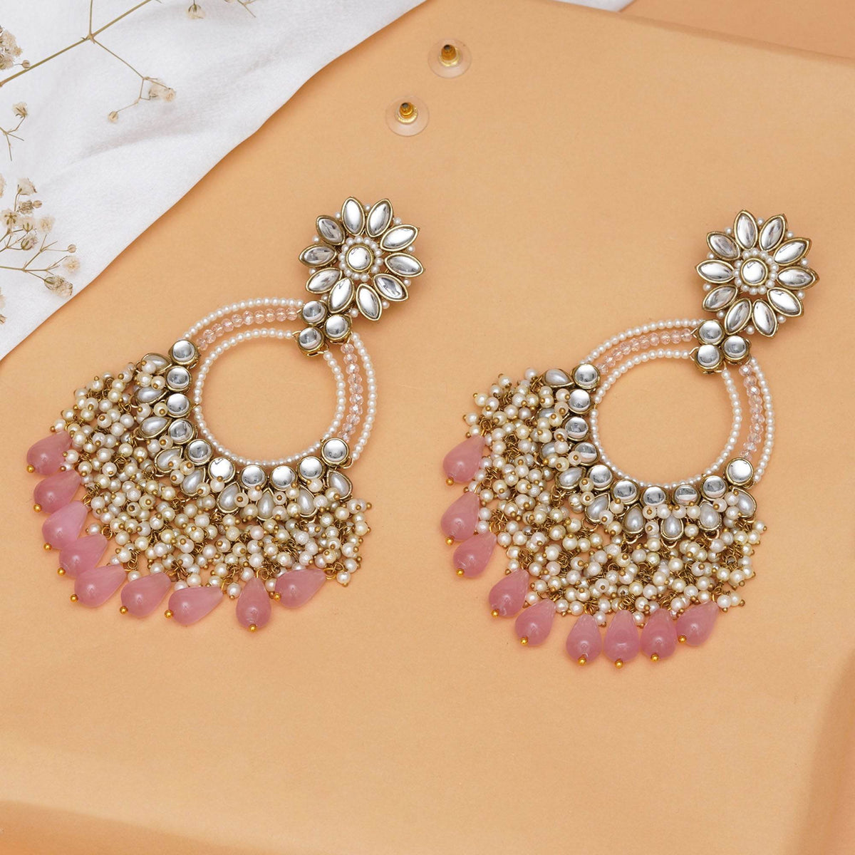 Traditional Kundan earrings in gold-tone, perfect for weddings and festive wear
