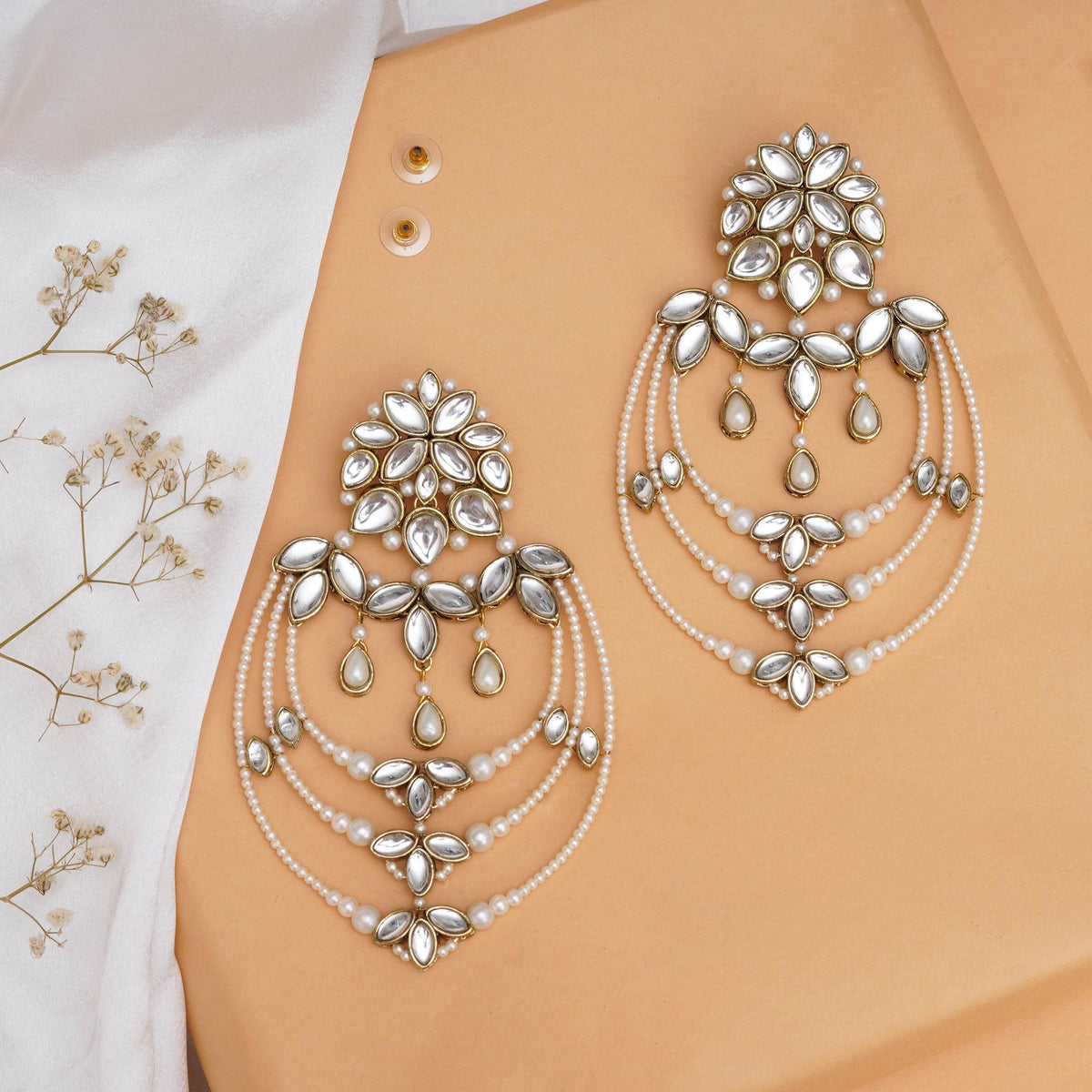 Traditional Kundan earrings in gold-tone, perfect for weddings and festive wear