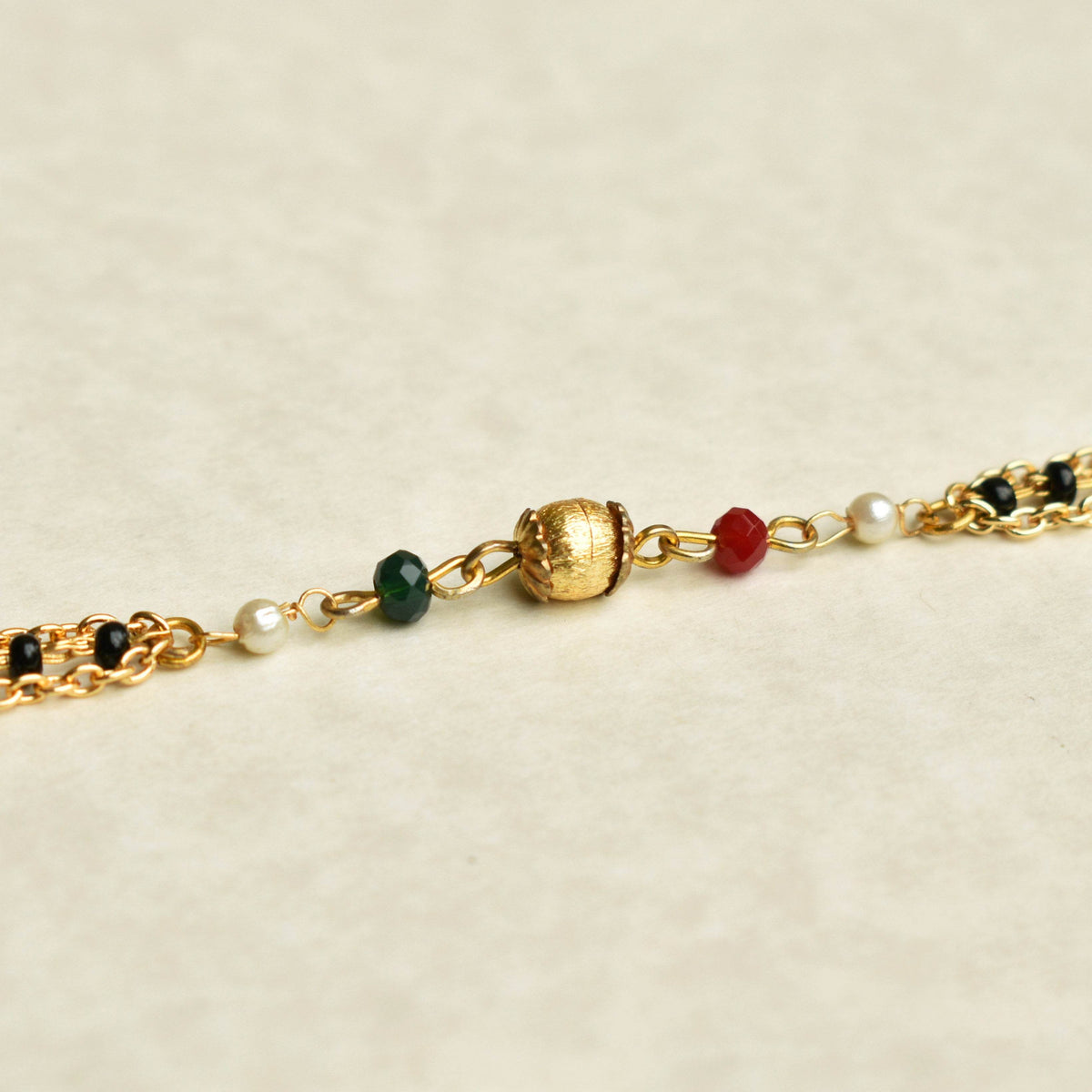black, red, golden beads mangalsutra bracelet