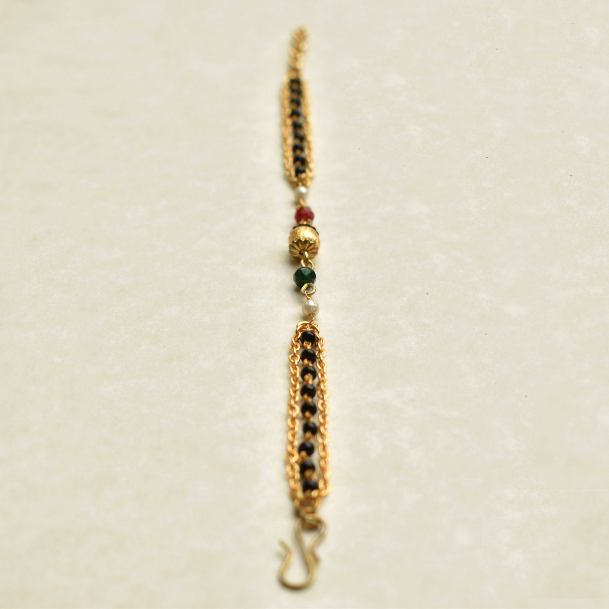black, red, golden beads mangalsutra bracelet