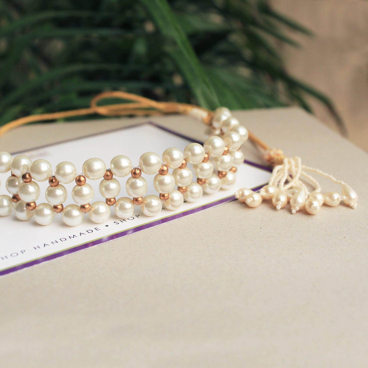 Kundan choker set in gold-tone with matching earrings and long bridal necklace, perfect for wedding functions , festive and bridal wear