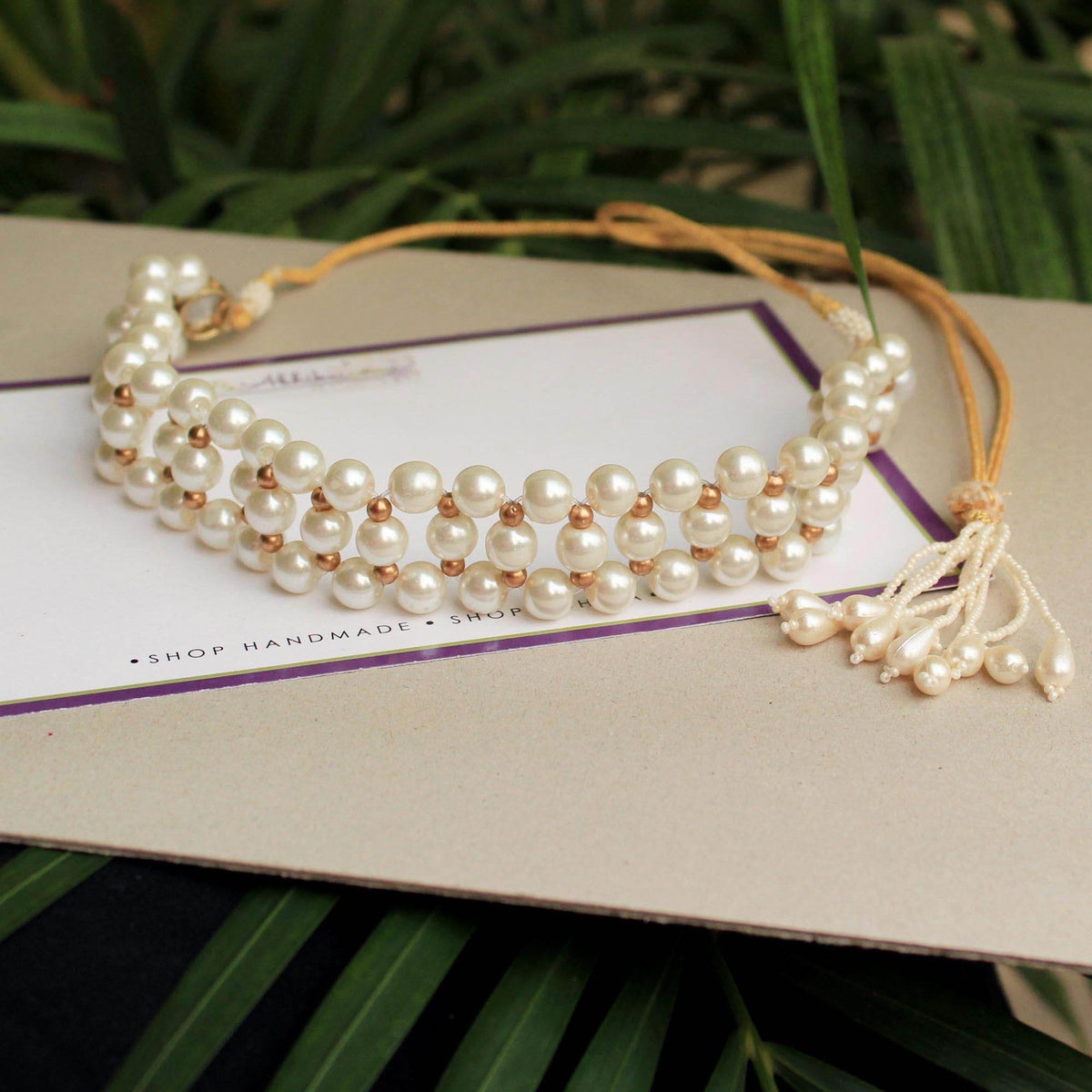 Kundan choker set in gold-tone with matching earrings and long bridal necklace, perfect for wedding functions , festive and bridal wear