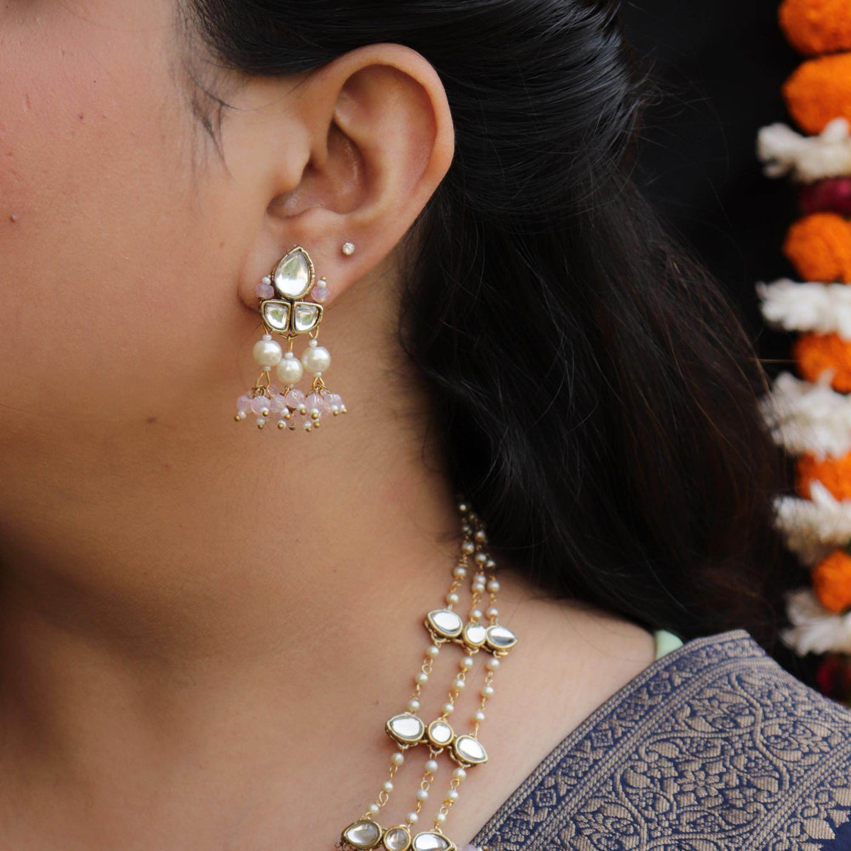 Kundan choker set in gold-tone with matching earrings and long bridal necklace, perfect for wedding functions , festive and bridal wear