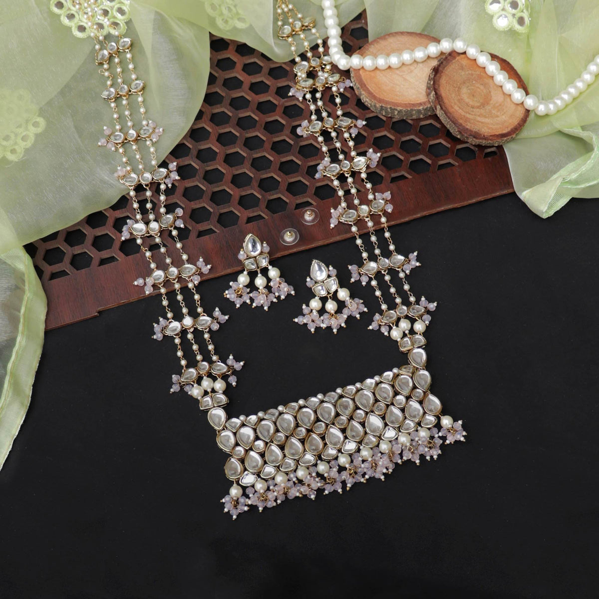 Kundan choker set in gold-tone with matching earrings and long bridal necklace, perfect for wedding functions , festive and bridal wear