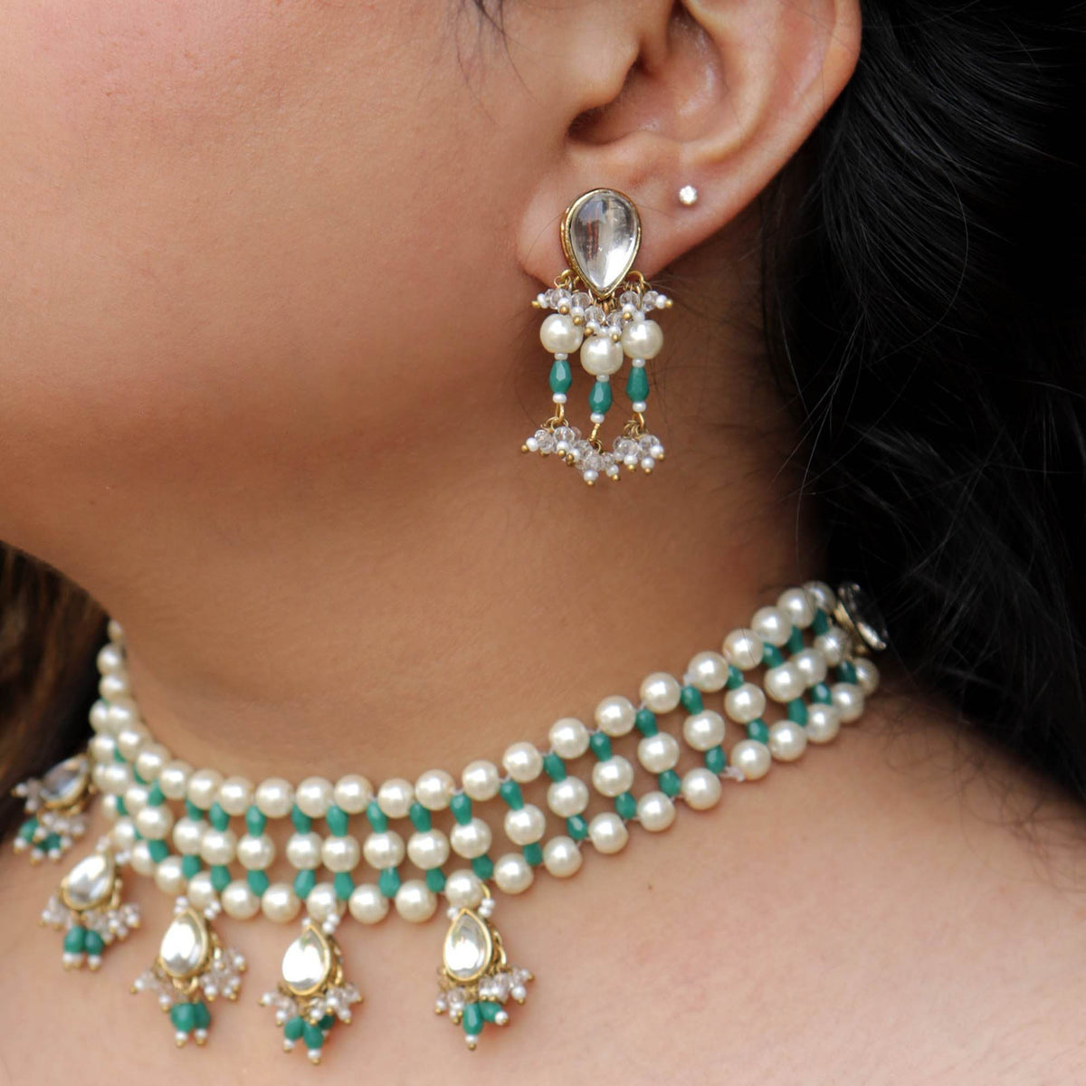 Kundan choker set in gold-tone with matching earrings and long bridal necklace, perfect for wedding functions , festive and bridal wear