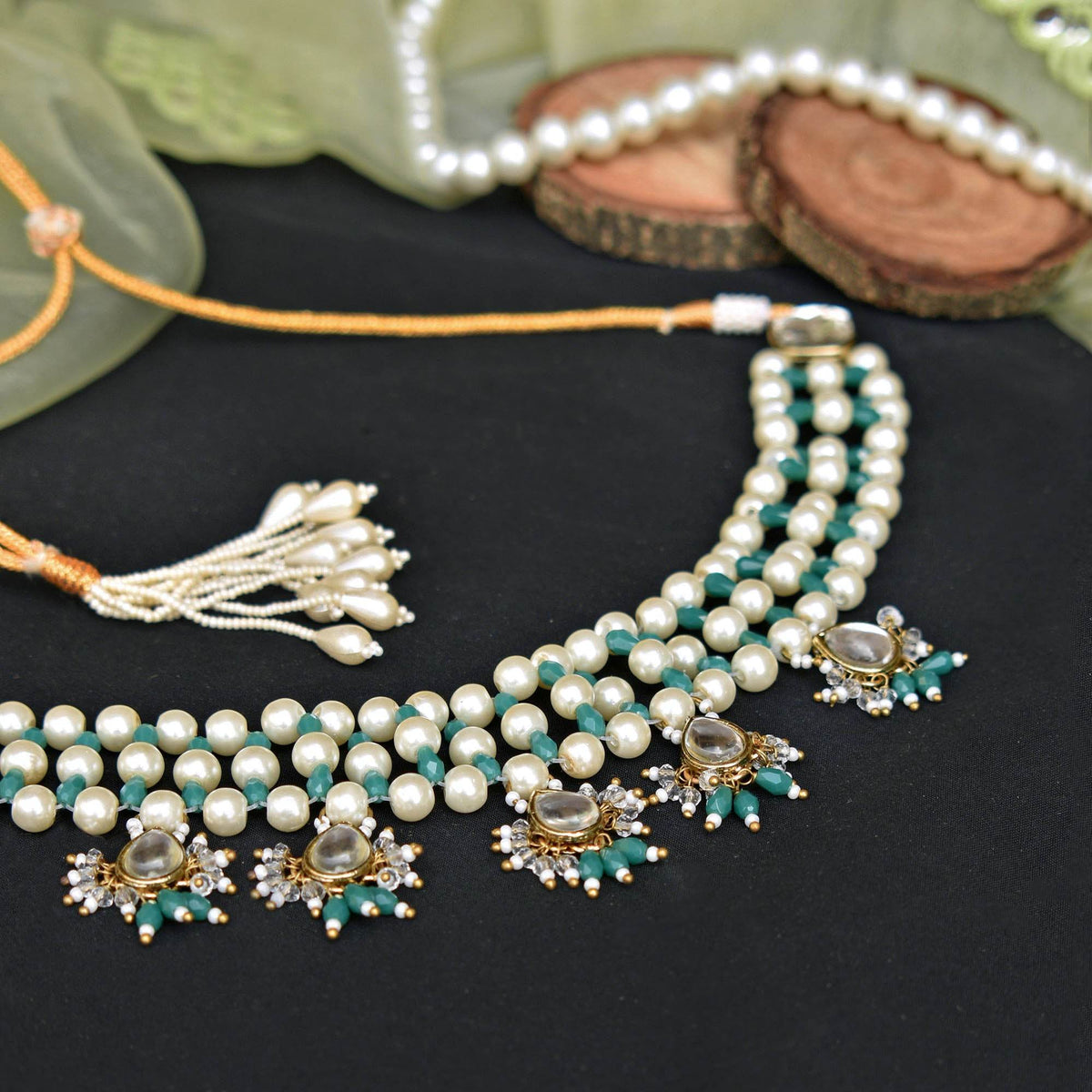 Kundan choker set in gold-tone with matching earrings and long bridal necklace, perfect for wedding functions , festive and bridal wear