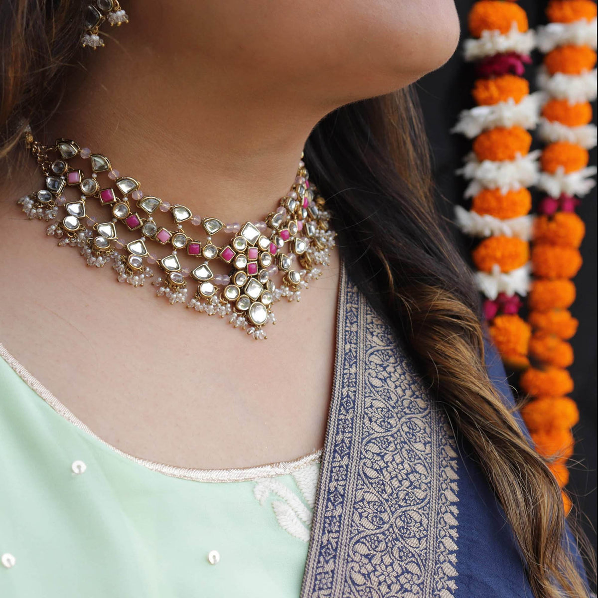 Kundan choker set in gold-tone with matching earrings and long bridal necklace, perfect for wedding functions , festive and bridal wear