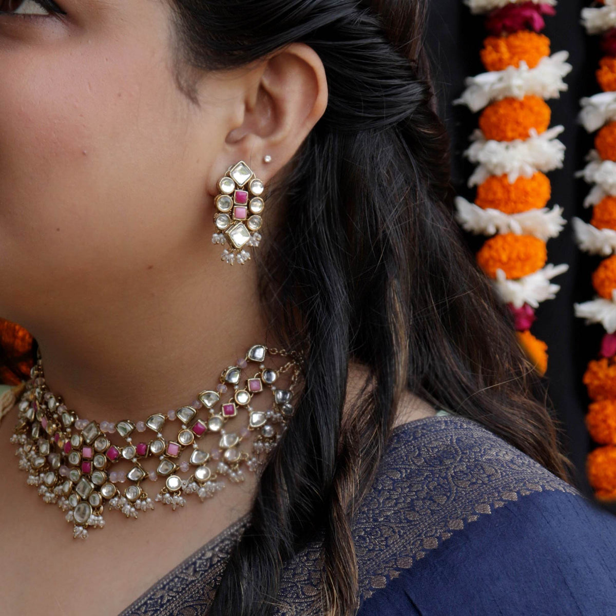Kundan choker set in gold-tone with matching earrings and long bridal necklace, perfect for wedding functions , festive and bridal wear