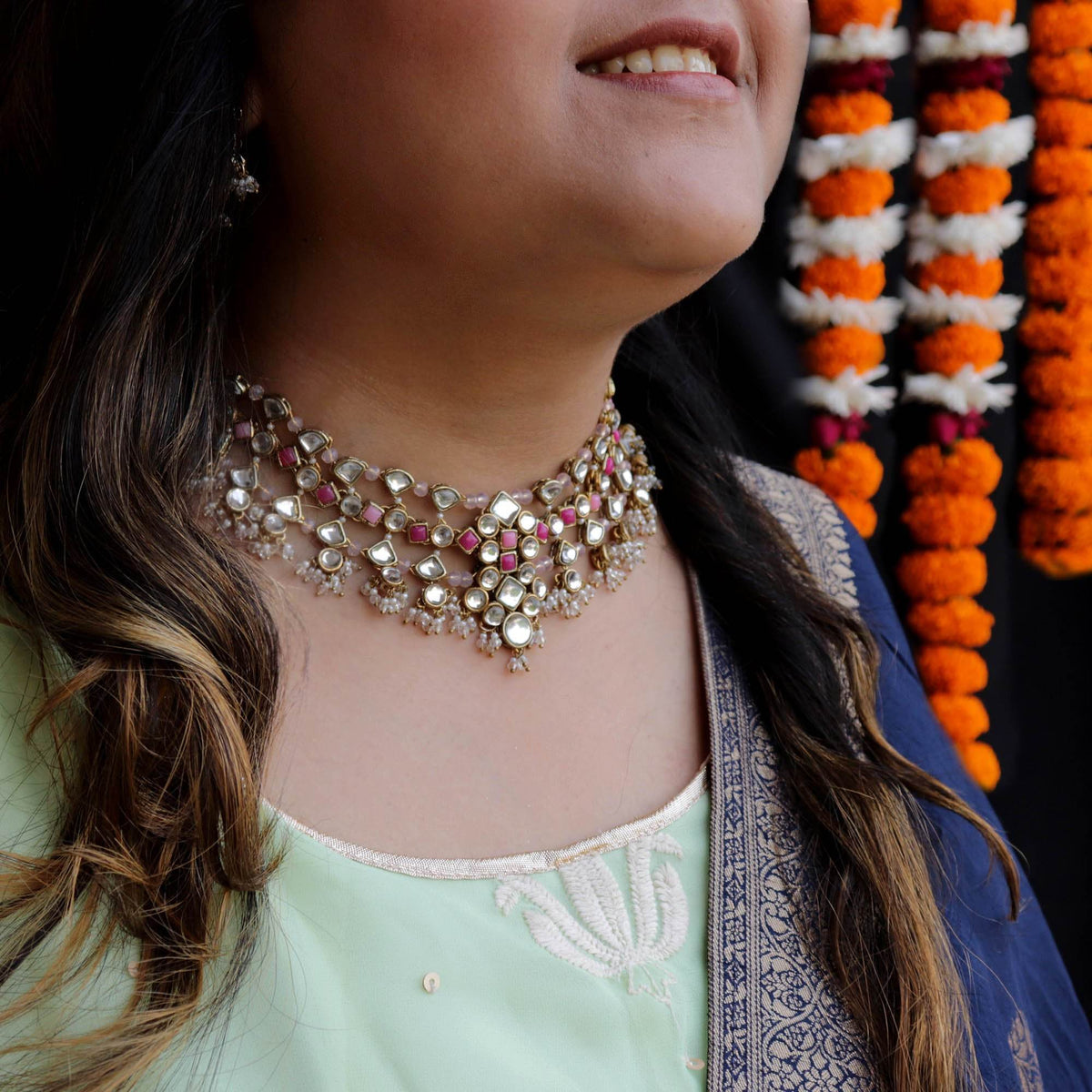Kundan choker set in gold-tone with matching earrings and long bridal necklace, perfect for wedding functions , festive and bridal wear