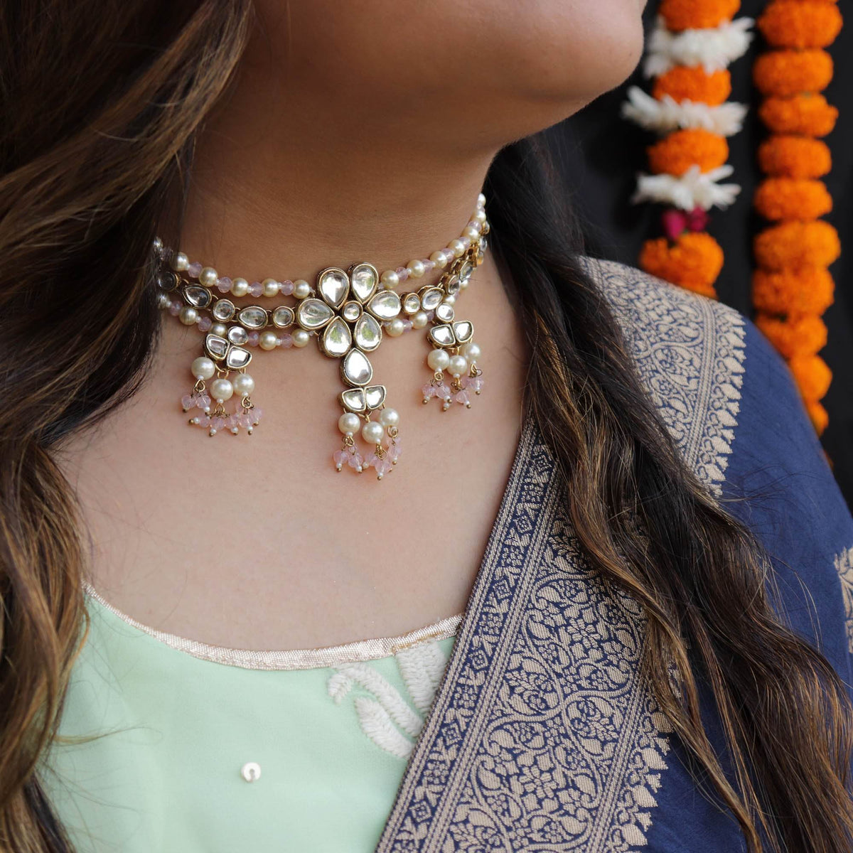 Kundan choker set in gold-tone with matching earrings and long bridal necklace, perfect for wedding functions , festive and bridal wear