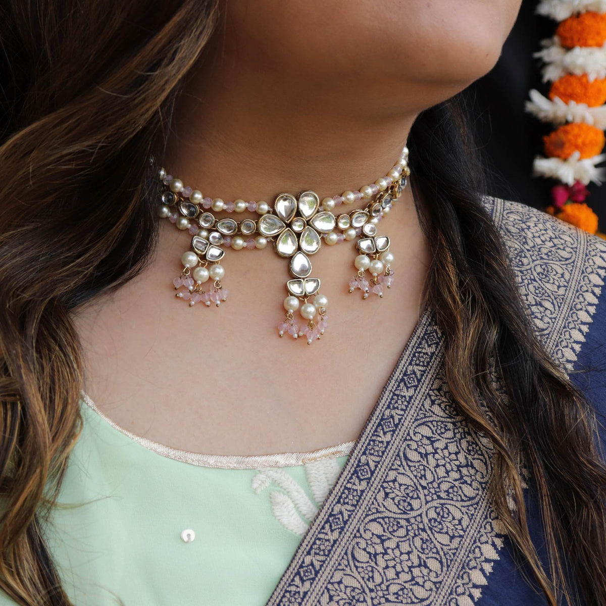 Kundan choker set in gold-tone with matching earrings and long bridal necklace, perfect for wedding functions , festive and bridal wear