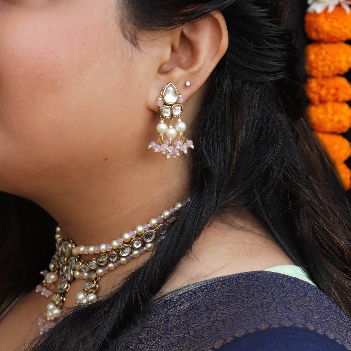 Kundan choker set in gold-tone with matching earrings and long bridal necklace, perfect for wedding functions , festive and bridal wear