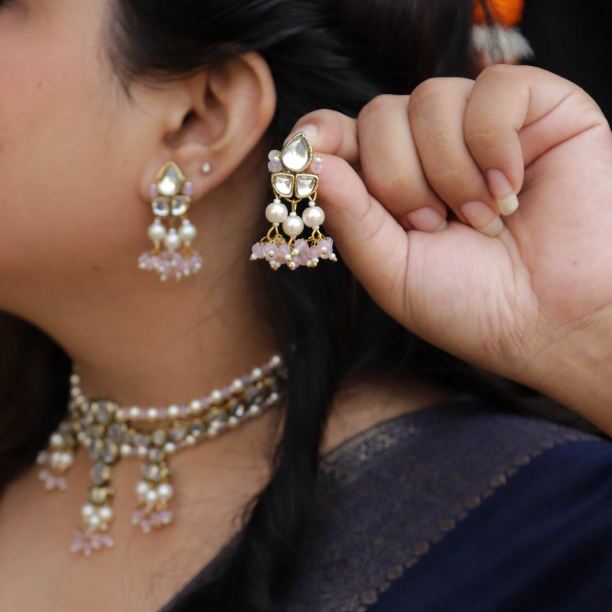 Kundan choker set in gold-tone with matching earrings and long bridal necklace, perfect for wedding functions , festive and bridal wear