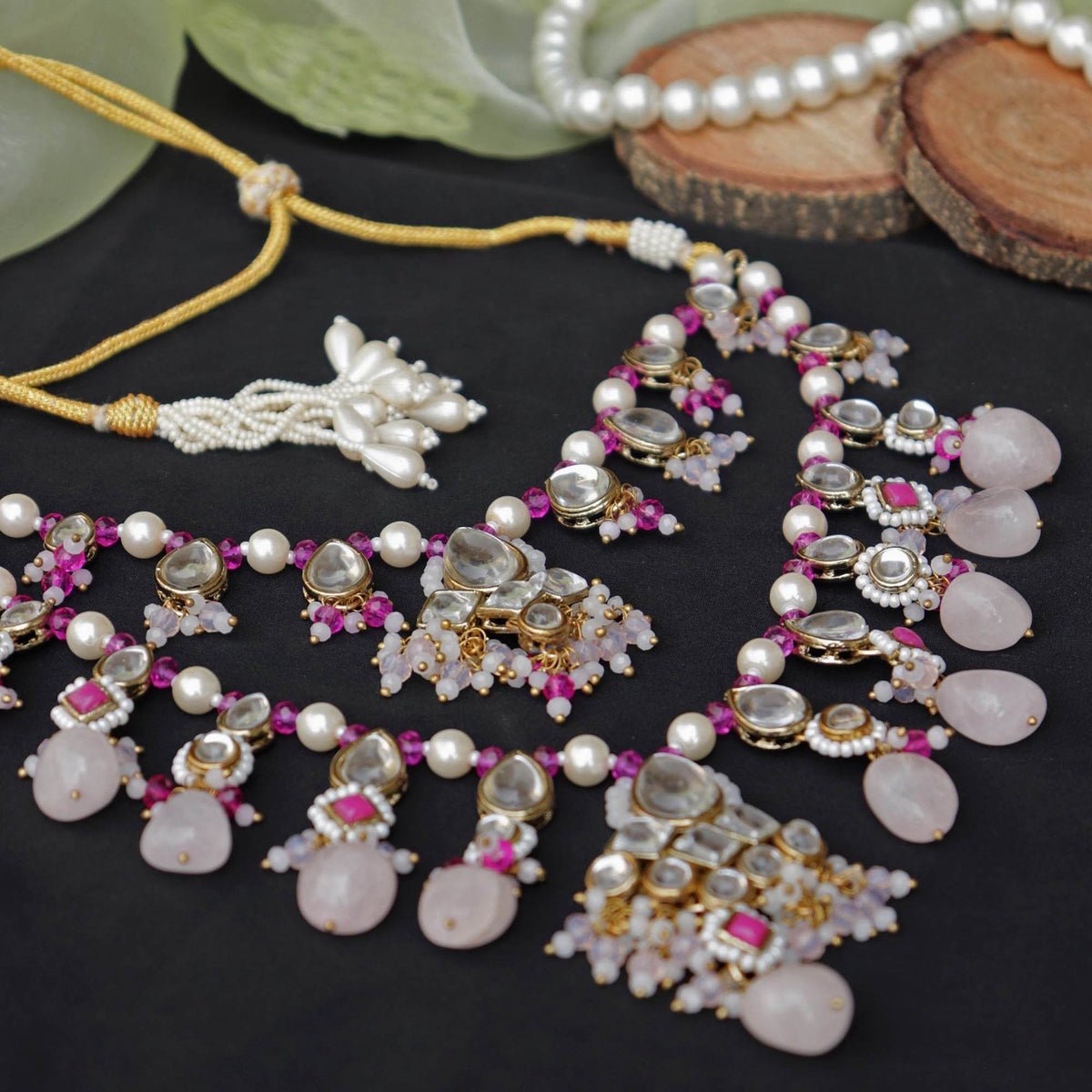 Kundan choker set in gold-tone with matching earrings and long bridal necklace, perfect for wedding functions , festive and bridal wear