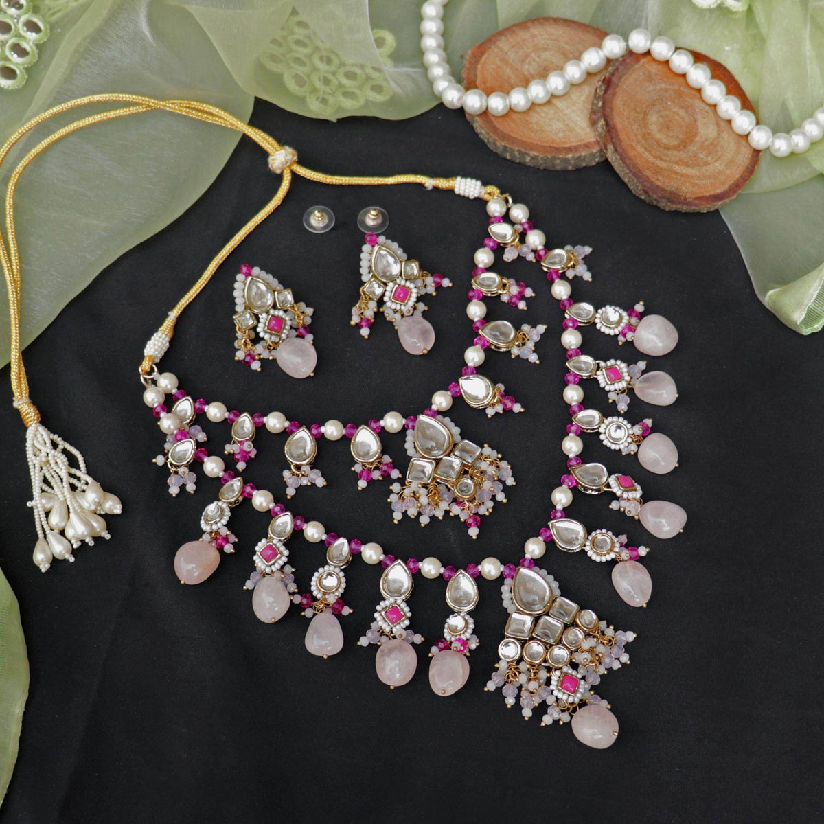 Kundan choker set in gold-tone with matching earrings and long bridal necklace, perfect for wedding functions , festive and bridal wear