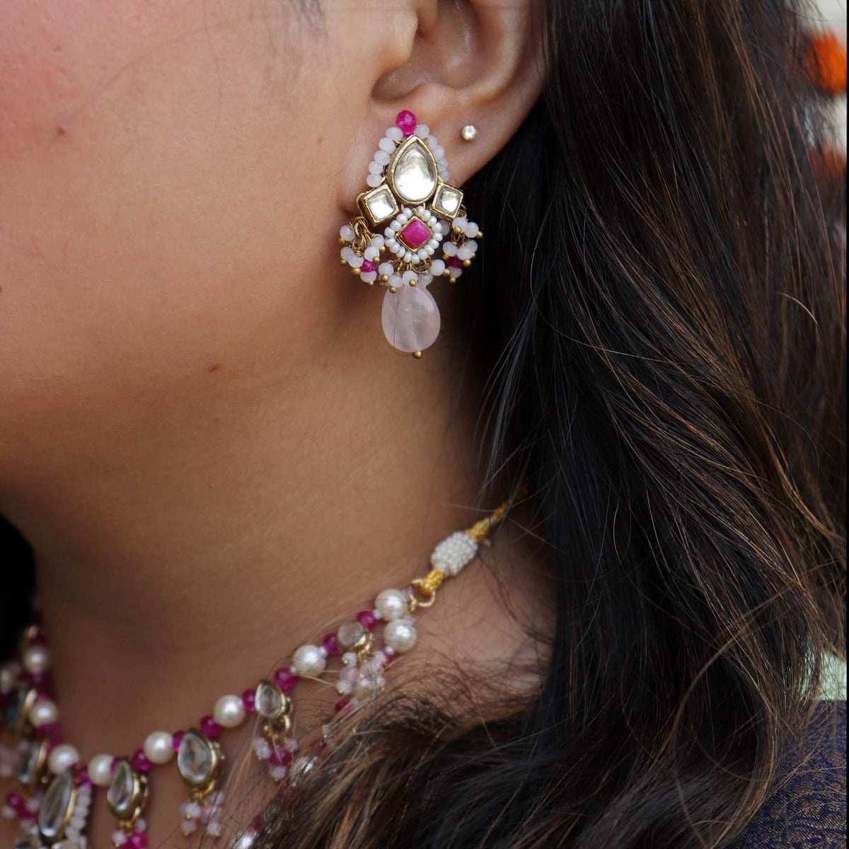 Kundan choker set in gold-tone with matching earrings and long bridal necklace, perfect for wedding functions , festive and bridal wear