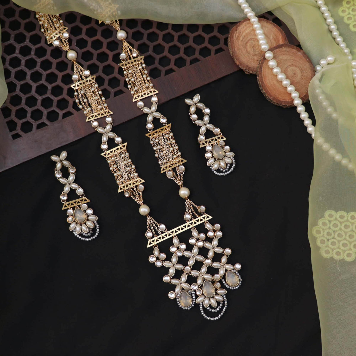 Kundan choker set in gold-tone with matching earrings and long bridal necklace, perfect for wedding functions , festive and bridal wear