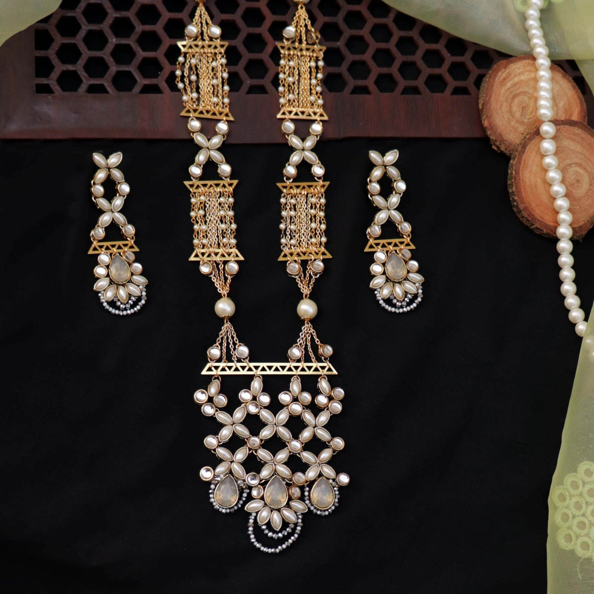 Kundan choker set in gold-tone with matching earrings and long bridal necklace, perfect for wedding functions , festive and bridal wear