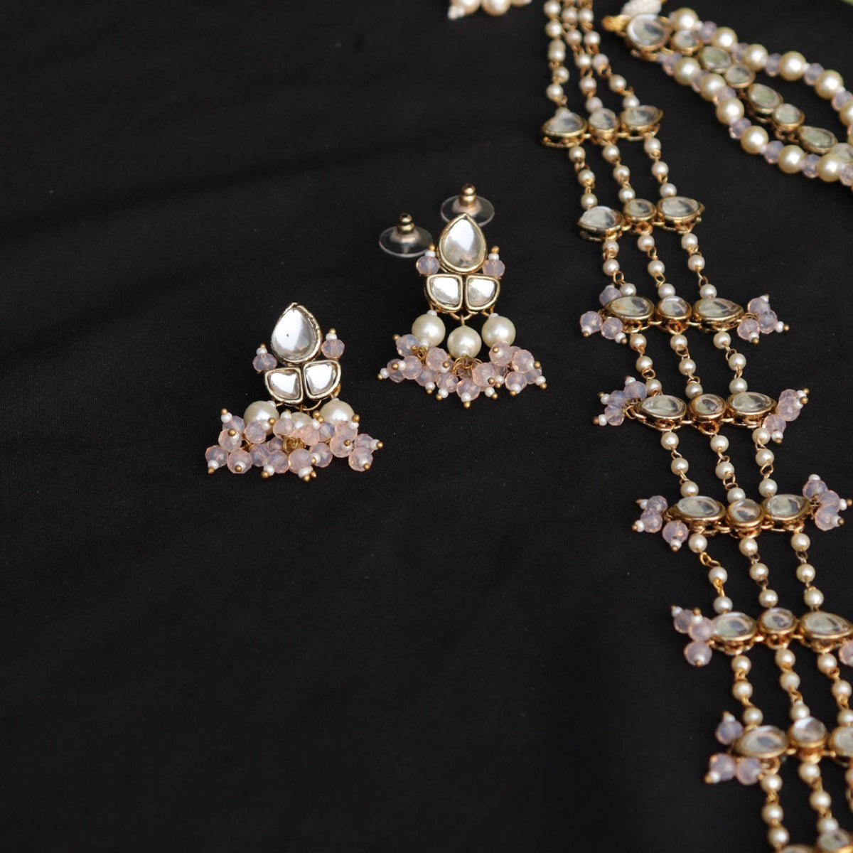 Kundan choker set in gold-tone with matching earrings and long bridal necklace, perfect for wedding functions , festive and bridal wear