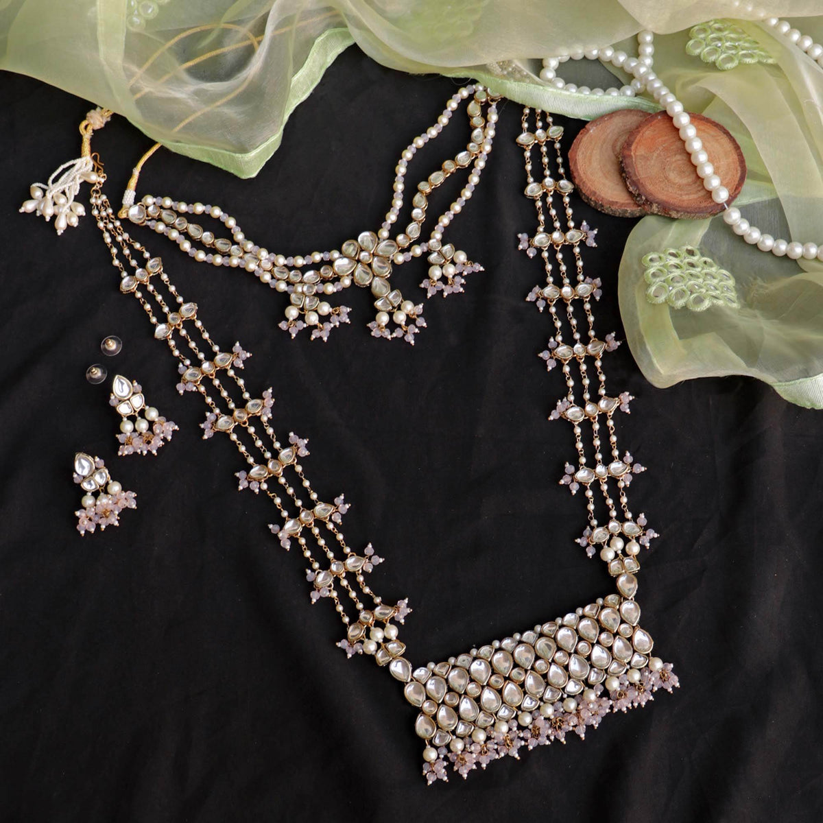 Kundan choker set in gold-tone with matching earrings and long bridal necklace, perfect for wedding functions , festive and bridal wear