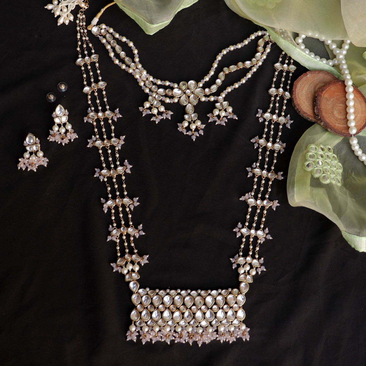 Kundan choker set in gold-tone with matching earrings and long bridal necklace, perfect for wedding functions , festive and bridal wear