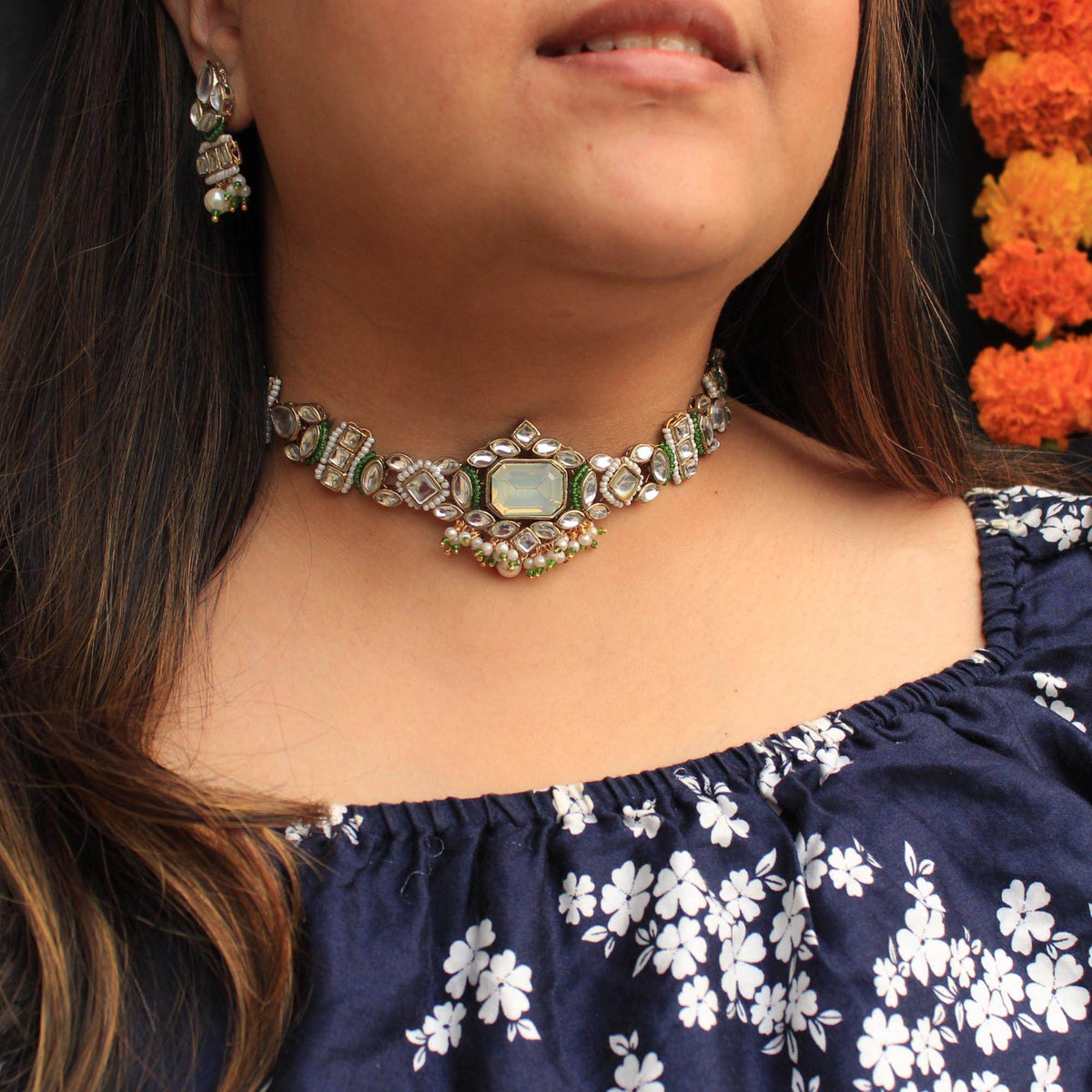 Kundan choker set in gold-tone with matching earrings and long bridal necklace, perfect for wedding functions , festive and bridal wear
