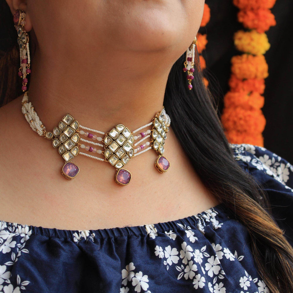 Kundan choker set in gold-tone with matching earrings and long bridal necklace, perfect for wedding functions , festive and bridal wear