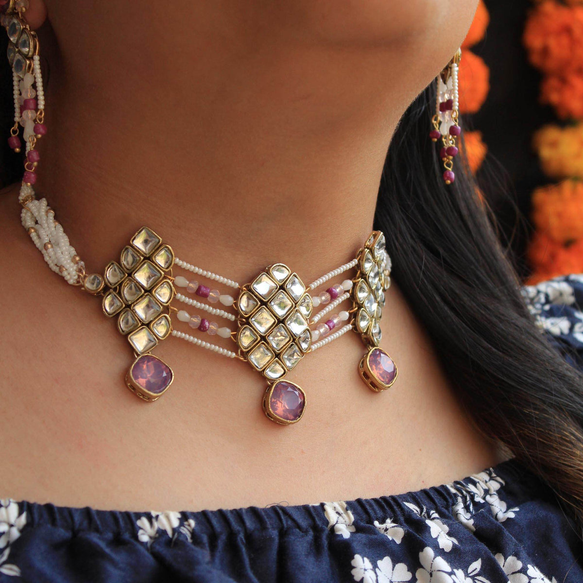 Kundan choker set in gold-tone with matching earrings and long bridal necklace, perfect for wedding functions , festive and bridal wear