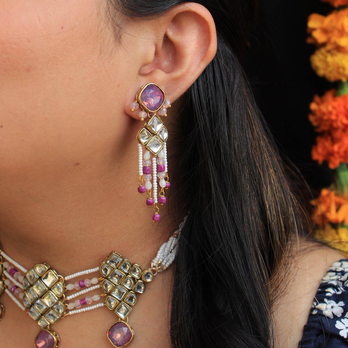 Kundan choker set in gold-tone with matching earrings and long bridal necklace, perfect for wedding functions , festive and bridal wear