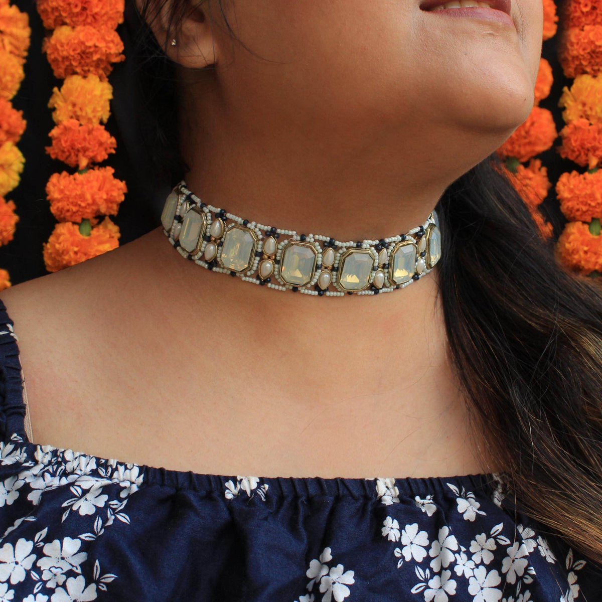 Kundan choker set in gold-tone with matching earrings and long bridal necklace, perfect for wedding functions , festive and bridal wear