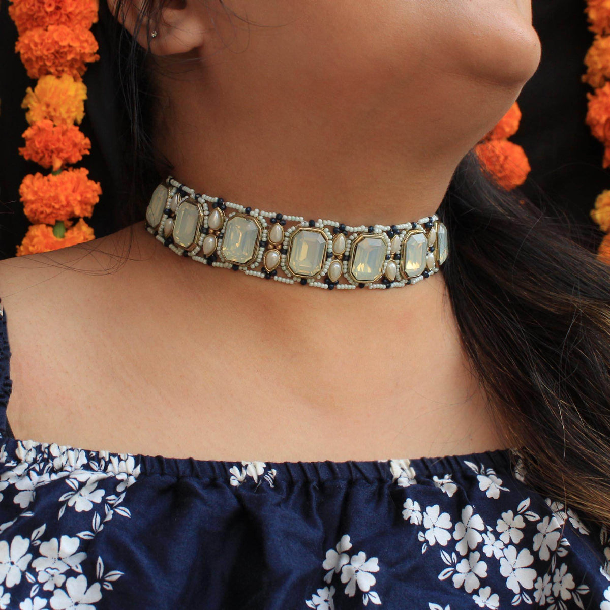 Kundan choker set in gold-tone with matching earrings and long bridal necklace, perfect for wedding functions , festive and bridal wear