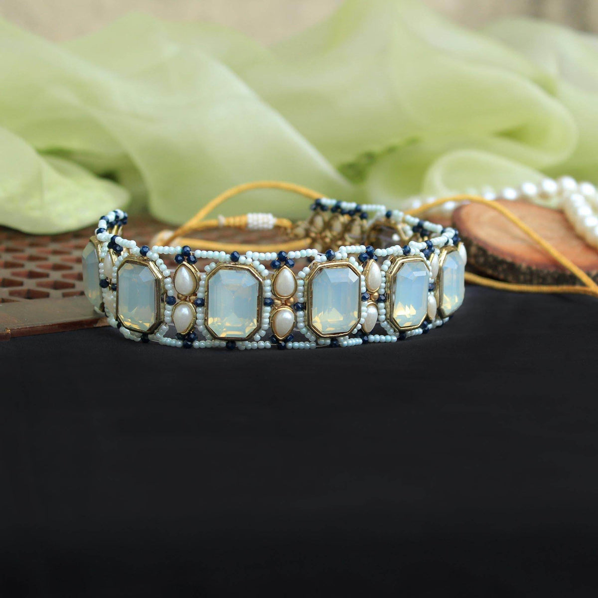 Kundan choker set in gold-tone with matching earrings and long bridal necklace, perfect for wedding functions , festive and bridal wear