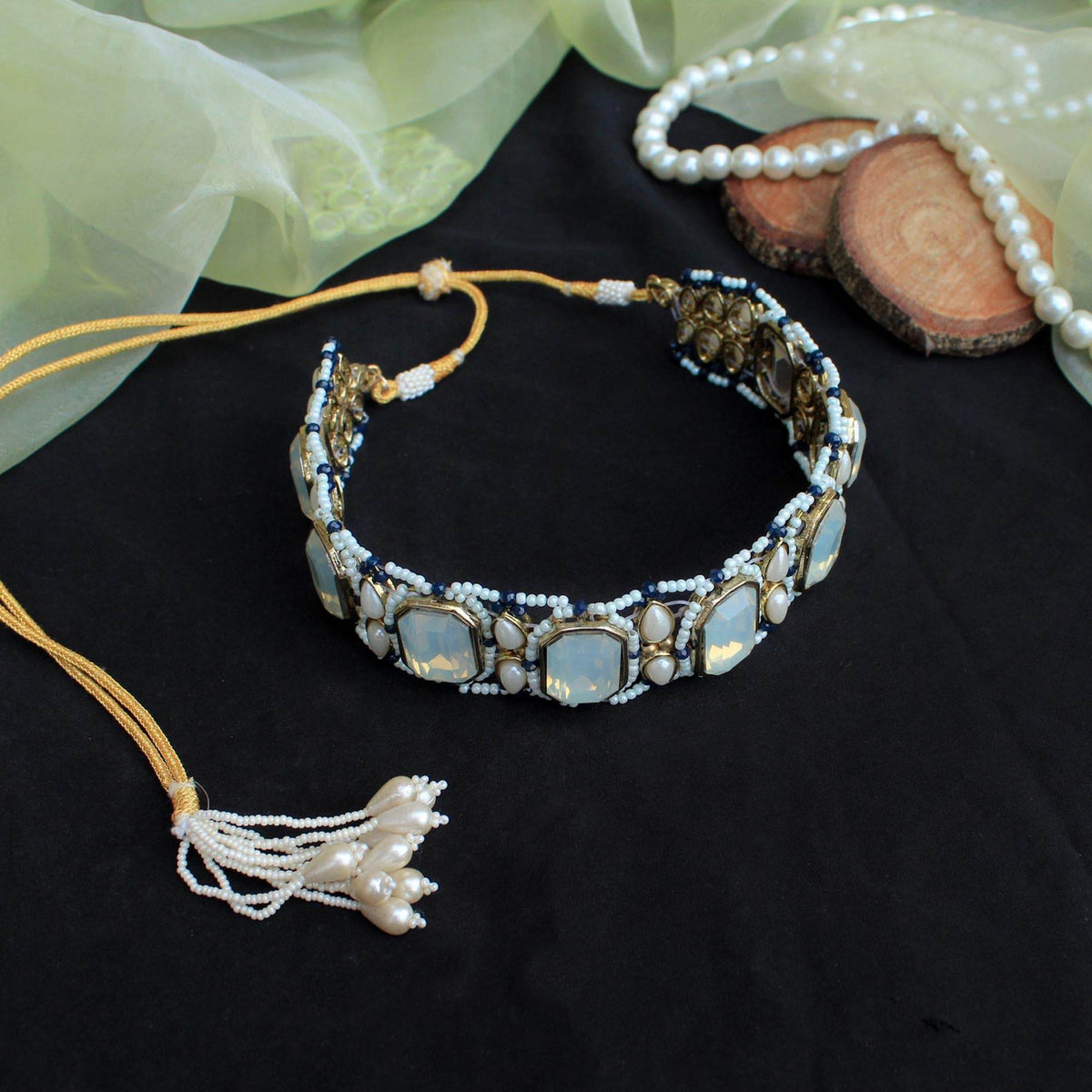 Kundan choker set in gold-tone with matching earrings and long bridal necklace, perfect for wedding functions , festive and bridal wear