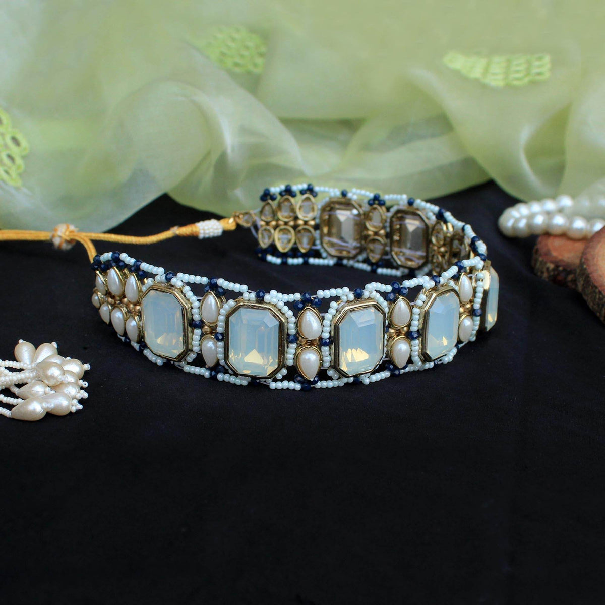 Kundan choker set in gold-tone with matching earrings and long bridal necklace, perfect for wedding functions , festive and bridal wear