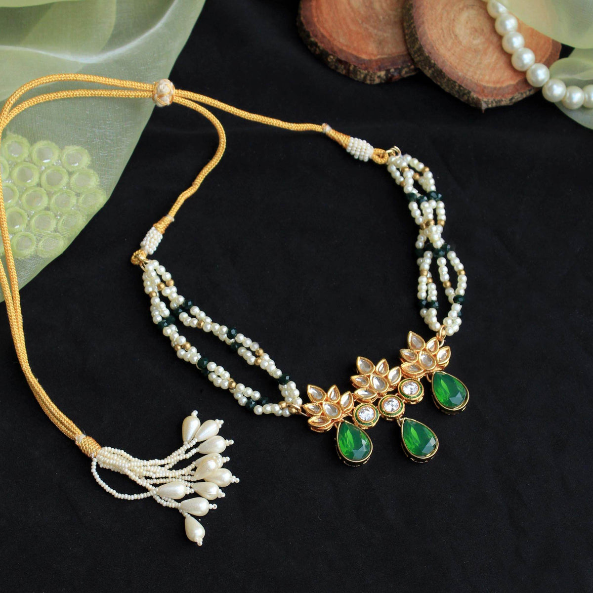 Kundan choker set in gold-tone with matching earrings and long bridal necklace, perfect for wedding functions , festive and bridal wear
