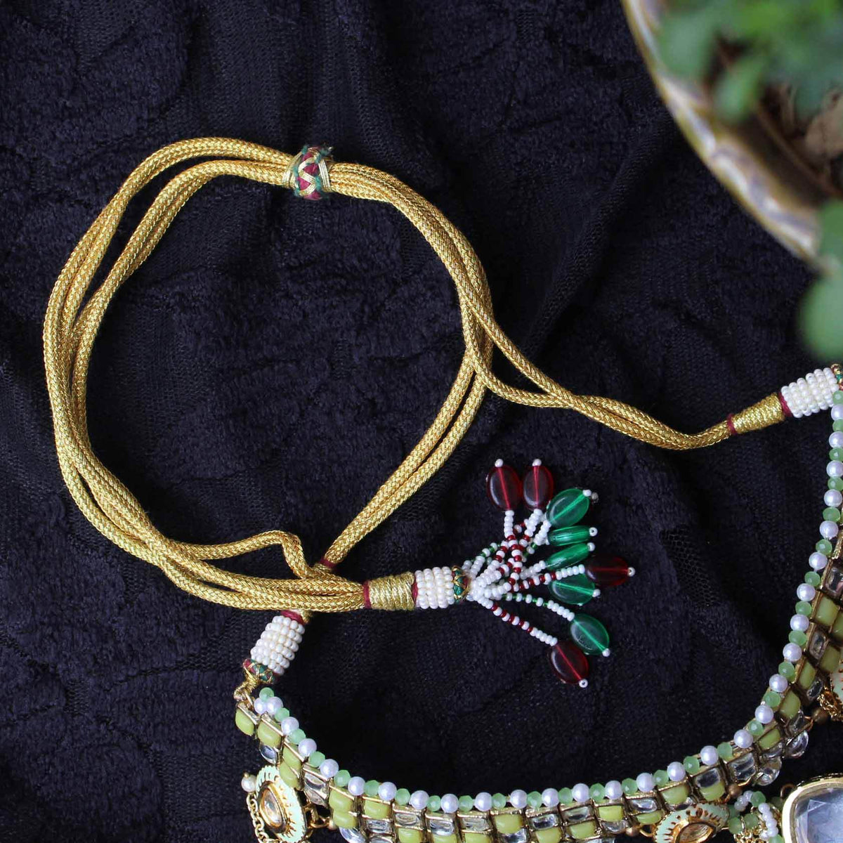 Kundan choker set in gold-tone with matching earrings and long bridal necklace, perfect for wedding functions , festive and bridal wear
