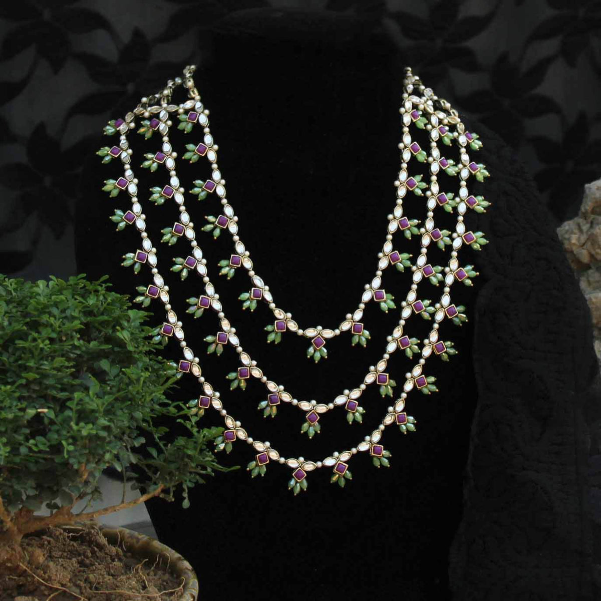 Kundan choker set in gold-tone with matching earrings and long bridal necklace, perfect for wedding functions , festive and bridal wear