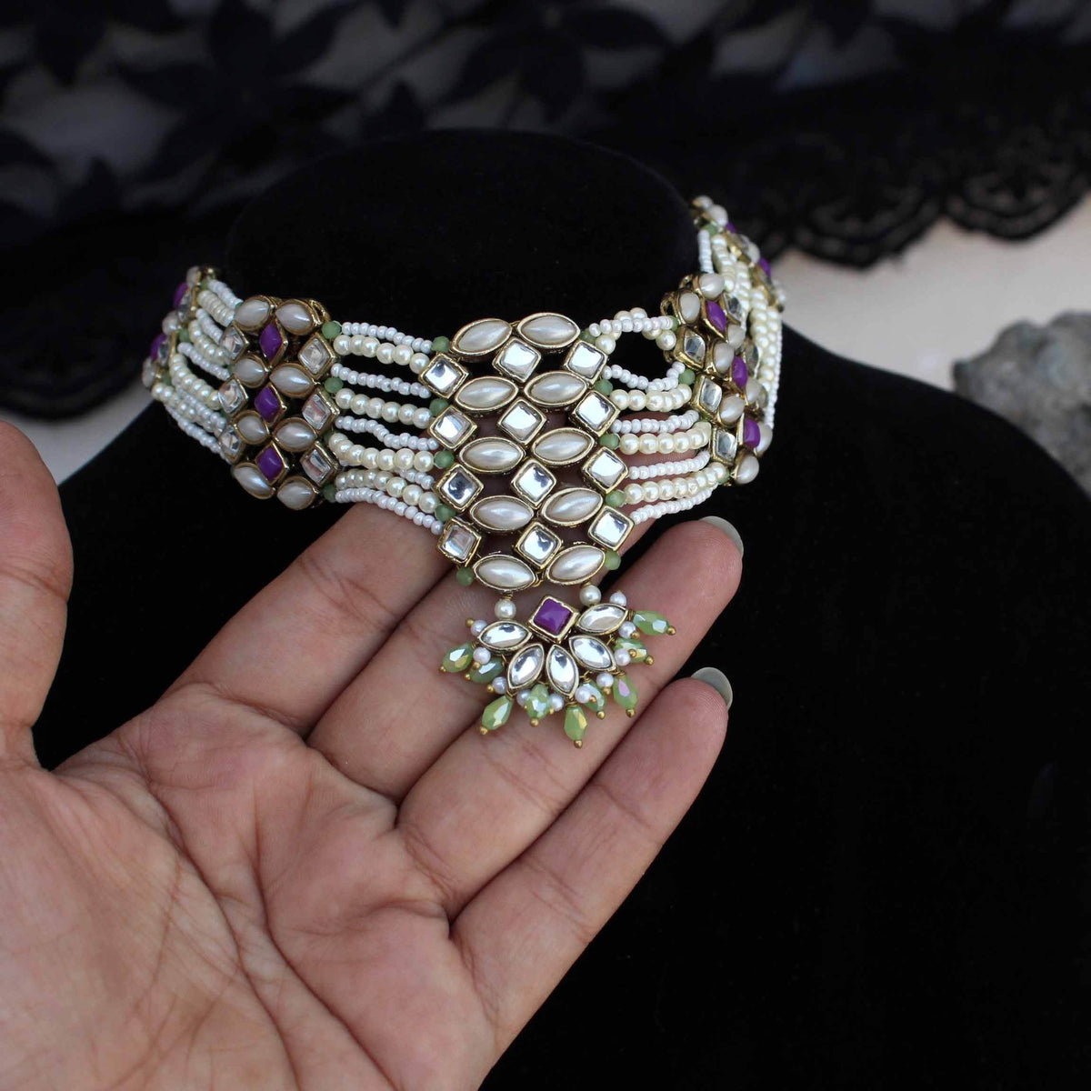 Kundan choker set in gold-tone with matching earrings and long bridal necklace, perfect for wedding functions , festive and bridal wear